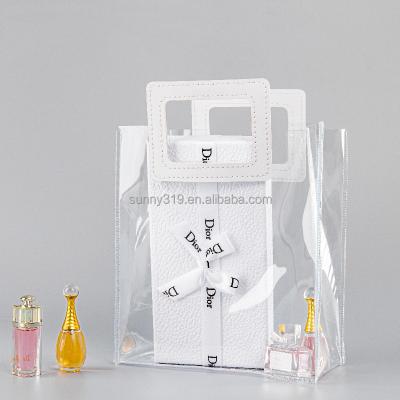 China Shock Resistance Reusable Plastic Transparent Pvc Button Bag Gifts Shopping Wrapped Tote Bag for sale