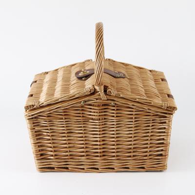 China Minimalist hand - woven home storage wicker fruit basket with handles picnic basket for sale