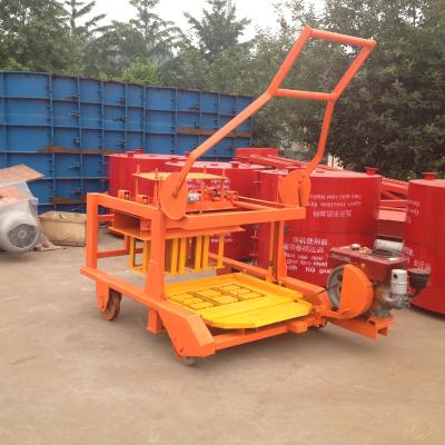 China Durable Diesel Engine QM4-45 Movable Laying Manual Concrete Hollow Block Making Machine for sale