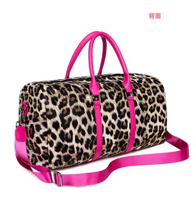 China Hot Sale Fashion PU Leopard Print Women Weekender Leather Luggage Bag Waterproof Travel Duffel Bag With Strap Leopard Duffel Bag for sale