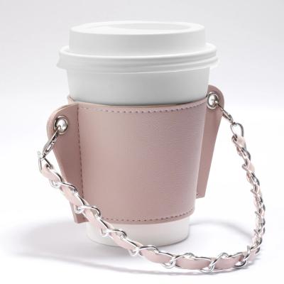 China Durable Portable Travel PU Cup Sleeve Luxury Leather Mug Carrier Coffee Sleeves Chain Beverage Handled Reusable Cup Holder With Strap for sale