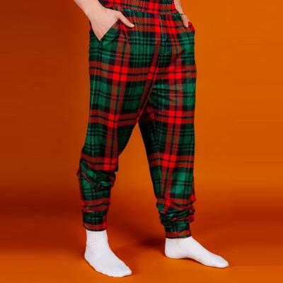 China Anti-Wrinkle Christmas Matching Clothes Set Elastic Waistband Pockets At Side Mens Plaid Pants Baggy Pants Men for sale