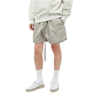 China Anti-Wrinkle Essential 2021 Summer Men's Custom Casual Track Shorts Custom Made Nylon Shorts With Long Strings for sale