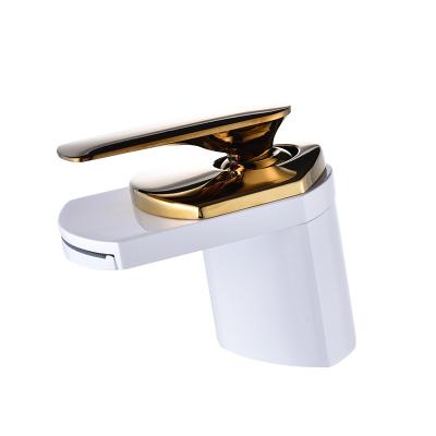 China Gold Plated Copper Basin Faucets Cold-Hot Copper Paint Basin Faucet Bathroom Waterfall White Metered Faucet for sale