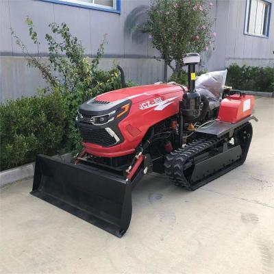 China Landbouwtractor met 50 pk, drooglandkruiper, tandwiel aandrijving Tuintractor voor landbouw Mulcher Te koop