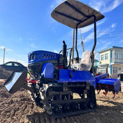 China Tractor de pequeña escala para el cultivo de huertos Tractor de rastrillo multifuncional de 35 CV con herramientas agrícolas en venta