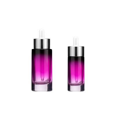 China 2021 New Personal Care Thick Wall Cylinder Flat Shoulder 1oz/30ml 50ml Purple Colored Glass Cosmetic Bottles With Rubber Dropper for sale