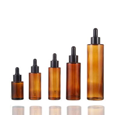 China Personal Care Luxury Empty Serum Packaging 30ml 40ml 60ml 100ml 200ml Shoulder Glass Amber Bottle With Black Plastic Dropper for sale