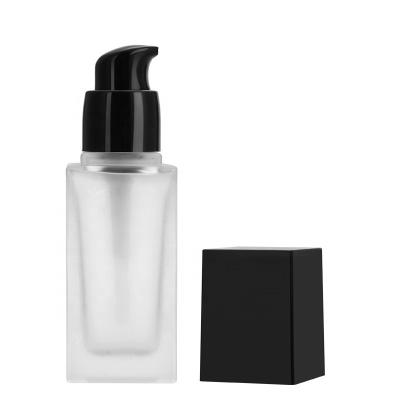 China New and Luxury Custom Frosted Clear Cosmetics Makeup Packaging Foundation Liquid Containers Glass Bottle With Pump for sale