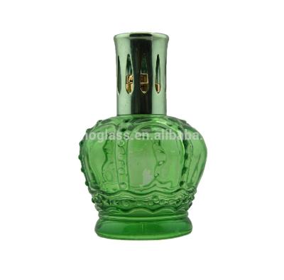 China Beautiful Personal Care Green 100l Crown Shaped Reed Glass Diffuser Bottle With Cap for sale