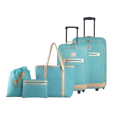 China 5pc polyester softside luggage set 20/24 inch travel bags luggage fabric suit checkout trolley bag for sale