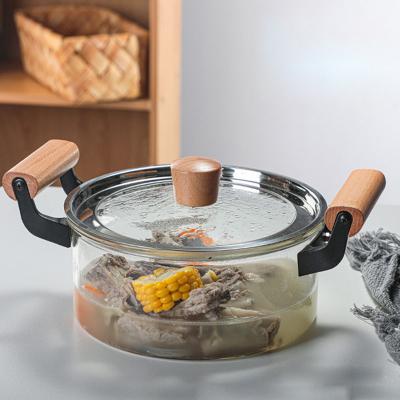 China High Sustainable Heat Resistant Borosilicate Glass Cooking Pot With Wooden Handle for sale