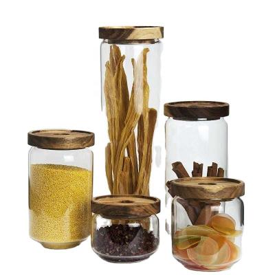 China Nordic Minimalist Transparent High Borosilicate Glass Sealed Jar With Wooden Lid For Dry Food for sale