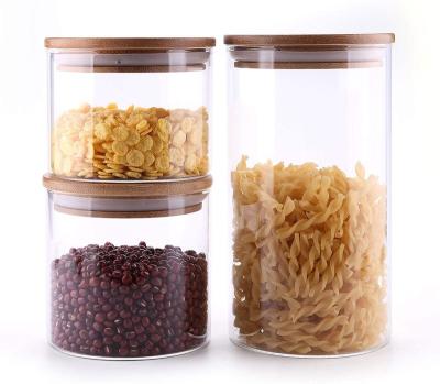 China Custom Glass Food Viable Airtight Canisters Storage Jar Storage Jar With Bamboo Lid For Tea Coffee Serving Spice for sale