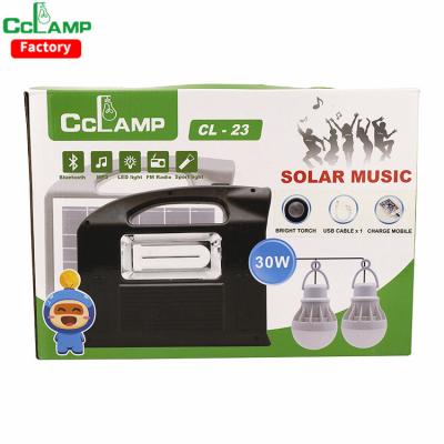 China Full Home Portable Solar Lighting Generator Kit with Music Radio Built-in Solar Panel and Torch with Extra LED Bulb Mobile Charger for sale