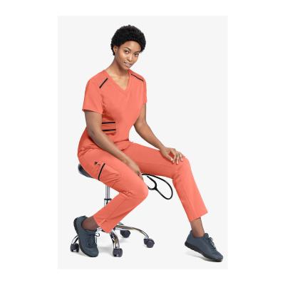 China Wholesale Stylish Anti-wrinkle Women Medical Scrub Comfort Fabric Set Unmatched V-Neckline Scrub Top& Cargo Scrub Pants For Nurse& Doctor for sale