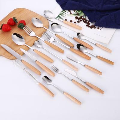 China Viable New Design Knife Spoon Fork Chopsticks Set Wooden Handle Stainless Steel Cutlery Set for sale