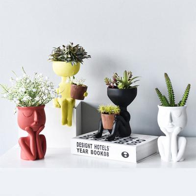 China Polyresin Vertical Garden Pots in High Quality Durable Abstract Floral Human Succulent Vase Flower Planter Resin Sculpture Cacti Multi-Use for sale