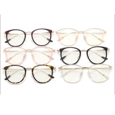 China 2020 fashion color transparent light and round shape comfortable fashion metal wholesale glasses frames optical frames for sale