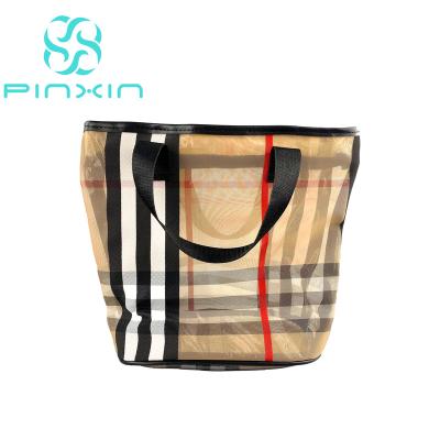 China Hot Selling Interior Handled With PVC Nylon Travel Toiletry Bag Waterproof Portable Pouch Mesh Shopping Bag for sale