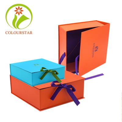 China Custom Recyclable Luxury Orange Rigid Folding Apparel Packaging Folding Paper Gift Box With Ribbon for sale