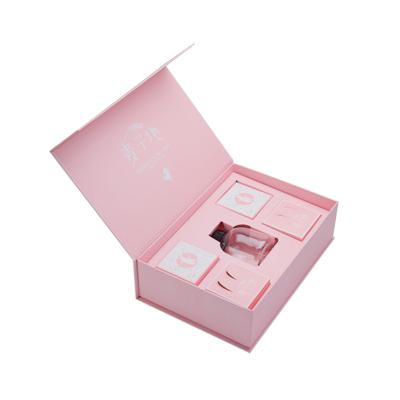 China Recyclable Personalization Cosmetic Paper Box Hard Book Form Magnetic Embossed Gold Foil Gift Folding Box for sale