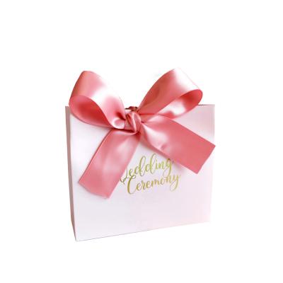 China Recyclable Customized Luxury Ribbon Tissue Paper Bags With Your Own Logo Paperboard Packages for sale