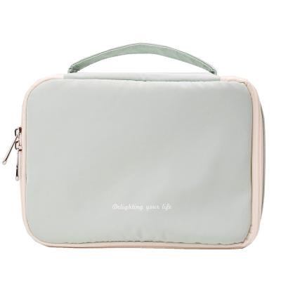 China Organizer Bag Women NATIONAL Toiletry Travel Bag Vegan Polyester PVC Cosmetic Makeup Bag for sale