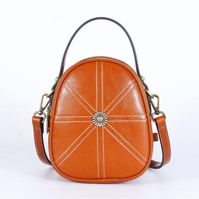 China 2021 fashion trendy vintage brassed rivet wax genuine cowhide backpack shell GENUINE LEATHER small cross - body bags for sale