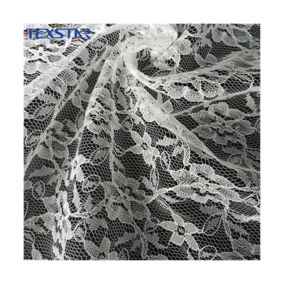 China Soft High Quality White Flower African Tulle Lace Fabric For Party for sale