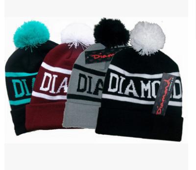 China OEM COMMON 100% Acrylic Pom Pom Knitted Fashion Beanie Hat for sale