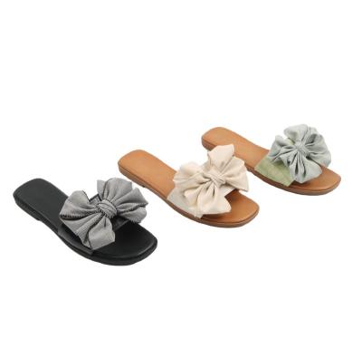 China Fashion Trend Fancy Flat Slippers For Girls PU Stimulus And Bowknot Decoration Women Slippers for sale