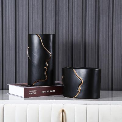 China Nordic line wholesale modern minimalist black ceramic vases home decoration design shape flower vases ware for sale