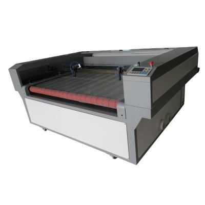 China Water cooling automatic feeding/automatic fabric/leather/clothing laser cutting machine for sale