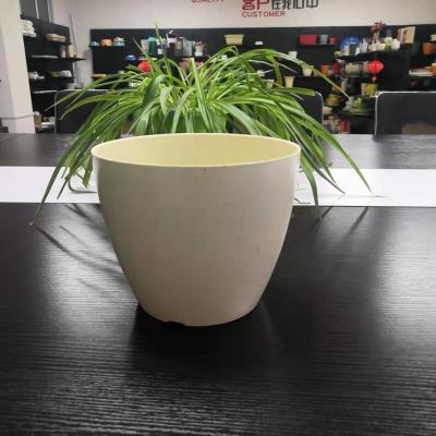 China Eco - Friendly Biodegradable Bamboo Fiber Solid Color Round Flower Pot for sale