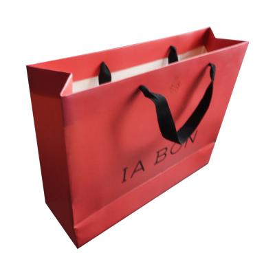 China Recycled Materials Cheap Wholesale Price Famous Brand Luxury Gift Custom With Your Own Logo Printed Shopping Paper Bags for sale