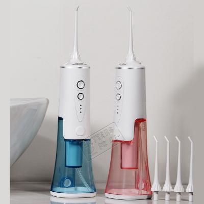 China Hotel Improve Portable Dental Oral Flosser Irriga Ultrasonic Electric Water Tooth Cleaner for sale