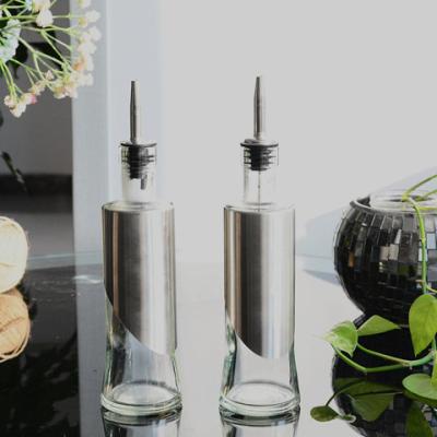 China Freshness Preservation Kitchen Oil Dispenser Glass Bottle With Metal Coating for sale