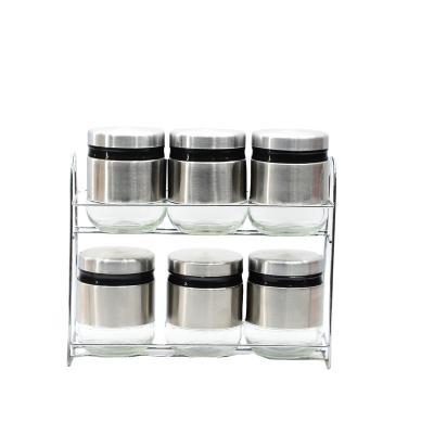 China Freshness Keeping Round Glass Storage Jar With Metal Liner And Metal Rack For Kitchen for sale