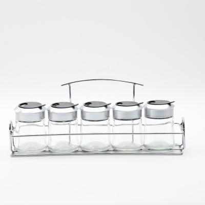 China Freshness Preservation Glass Spice Jar With Metal Holder And Plastic Lid for sale