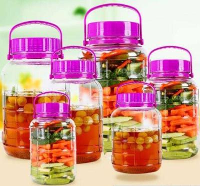 China Sustainable Large Volume Glass Food Storage Container Pickle Jar With Plastic Lid for sale