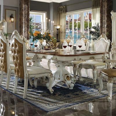 China Wood Top European Style Luxurious Wooden Dining Sets Heavy Carved Royal Dining Table Set 8 Chairs for sale