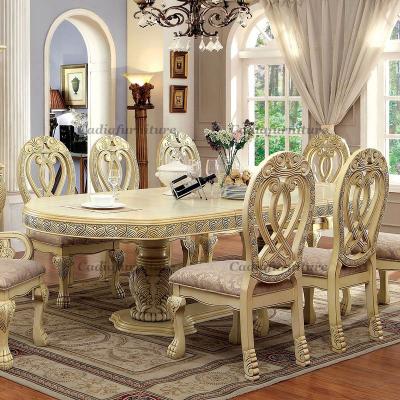 China 2022 Style Solid Wood French Head Luxury Antique Carved Dining Table Long With 8 Chairs for sale