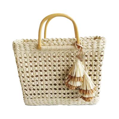 China Water Resistant Custom Women Handmade Hard Shape Straw Bag With Wristlet Handle for sale