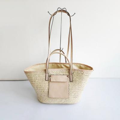 China Water Resistant Hot sale women's fashion handbags Casual beach straw bag women's woven shoulder bag Double Handle Straw handbag for sale