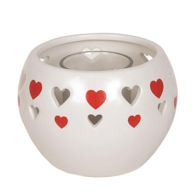 China Tea Light Candle Holder Red Heart Hollowed Design Valentines Festival Ceramic Tea Light Candle Holder for sale