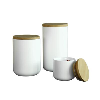 China Sustainable Nordic Ins Cylinder Ceramic Food Storage Box Small Storage Jar With Lid for sale