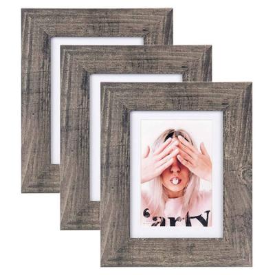 China Eco-Friendly Set Of 3 Brown Style Dark Rustic Distressed Wall Mounting Durable Wooden Picture Picture Frames for sale