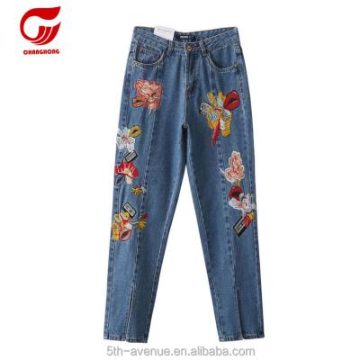 China Women Breathable Jeans Flower Embroidery Design Loose Ripped Jeans for sale