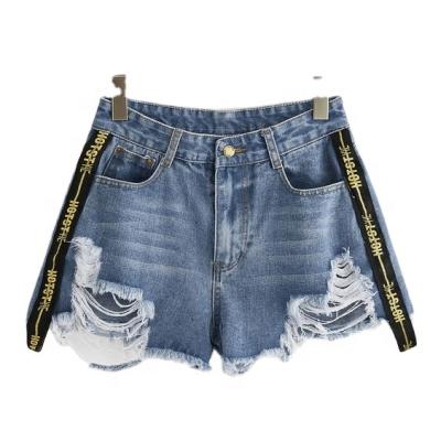 China Fashionable Color Fade Proof Hot Sale Streetwear Ripped Women Side Stripe Denim Shorts Striped Jeans With Tassel Leg for sale